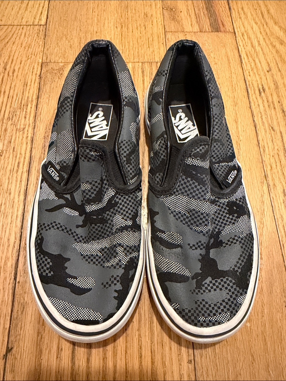 Vans Slip-On Camouflage Canvas Sneakers in Black & Gray